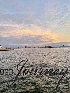 barge leaving Duluth at sunset