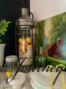 lantern on a mantel display for summer