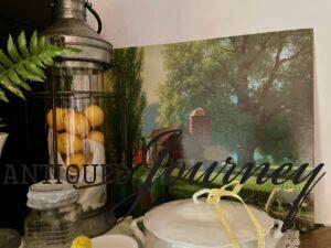 thrifted art used on a mantel for summer
