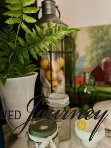 vintage decor styled on a mantel for summer