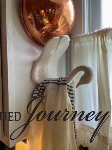 a vintage swan towel holder for pretty and practical kitchen decor