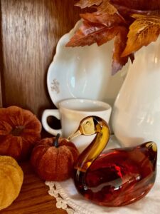 amber glass swan found at an antique store for vintage fall decor