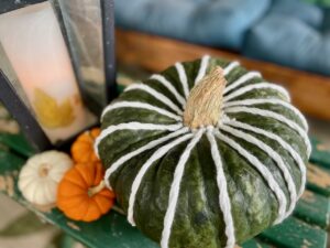 DIY yarn-wrapped pumpkin for fall decor