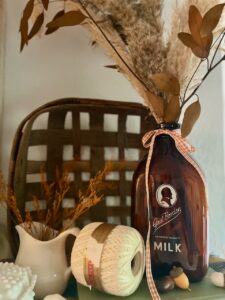 vintage glass milk bottles for fall decorating