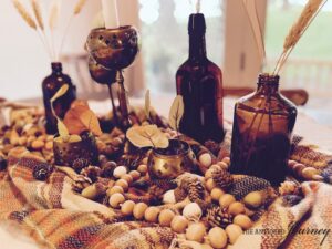 vintage bottles used for a fall table centerpiece
