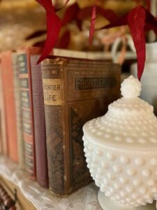 vintage glassware styled on a mantel
