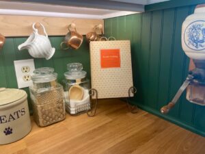 Julia Childs cookbook styled in a vintage-style kitchen