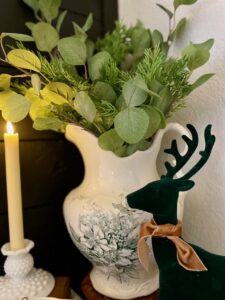 faux Christmas greens on a mantel