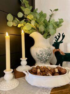 faux taper candles on a mantel