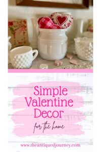 milk glass decor on a shelf for Valentine's day