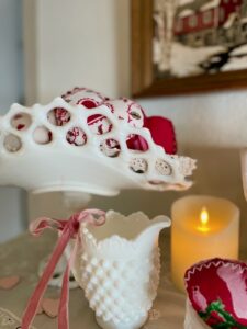 vintage milk glass vases on a Valentine shelf display