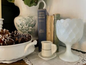 vintage milk glass compote styled on a mantel for budget home decor