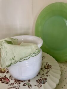 a vintage lace hanky sticking out of a bowl