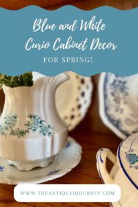 blue and white vintage decor in a antique cabinet