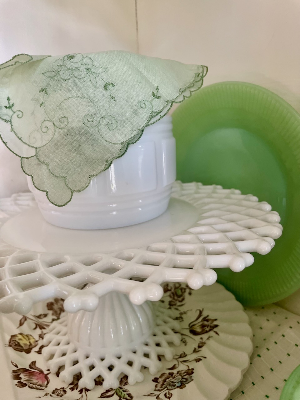A thrifted milk glass cake stand found at the thrift store
