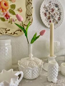 A collector's home corner styled with intentional vintage finds after responsible decluttering