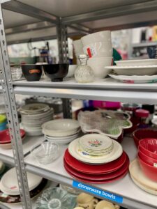 thrift store shelves-donating and decluttering vintage items to thrift stores