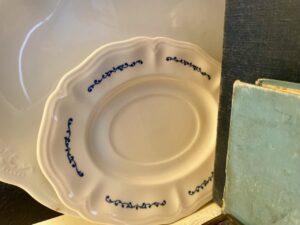 Thrifted vintage finds styled together in a home vignette