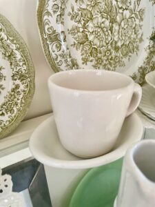 Vintage ironstone styled in a farmhouse-inspired home vignette