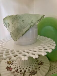 A collection of secondhand vintage home decor finds from the thrift store