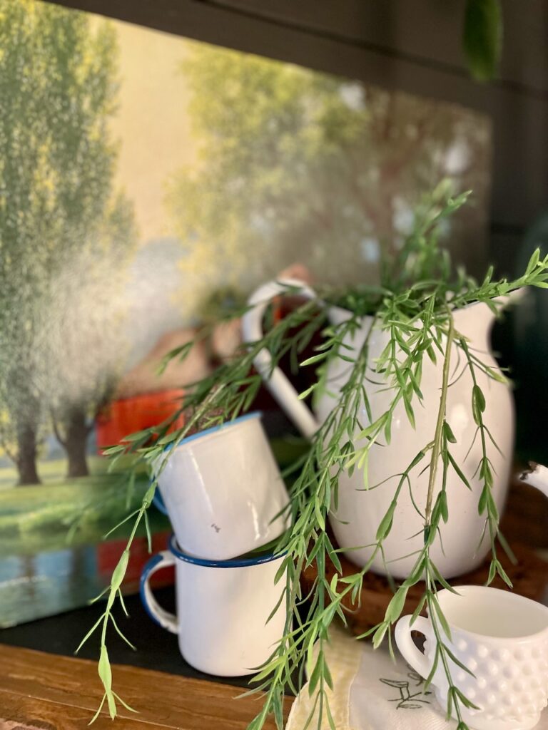 summer mantel decor with vintage enamelware