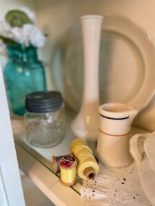 vintage blue ball jars and other vintage decor finds for a summer hutch