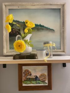 thrifted barn landscape styled on a wall