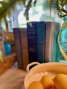 vintage summer decor with blue antique books and thrifted finds