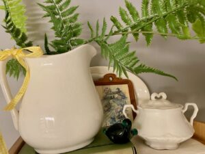 vintage ironstone styled for summer in a small bathroom