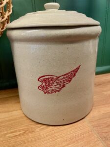 a red wing pottery marking on a vintage crock