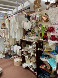 antique store booth curated with vintage home finds