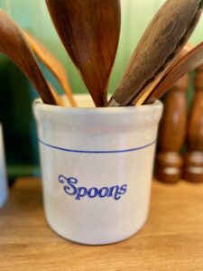 vintage spoon crock found secondhand styled in a kitchen