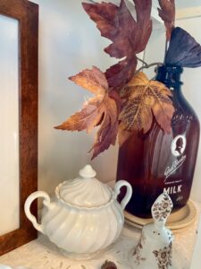 vintage amber glass jars with fall stems hutch decor ideas