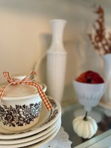 vintage fall decor, brown transferware styled in a hutch