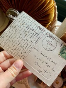 old writing on an old postcard 