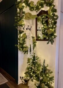 fully lit and finished Christmas entryway display